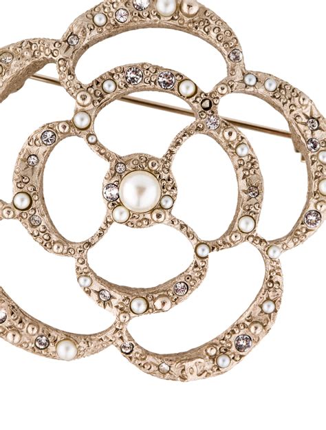 chanel camellia brooch collection|Chanel pearl brooch price.